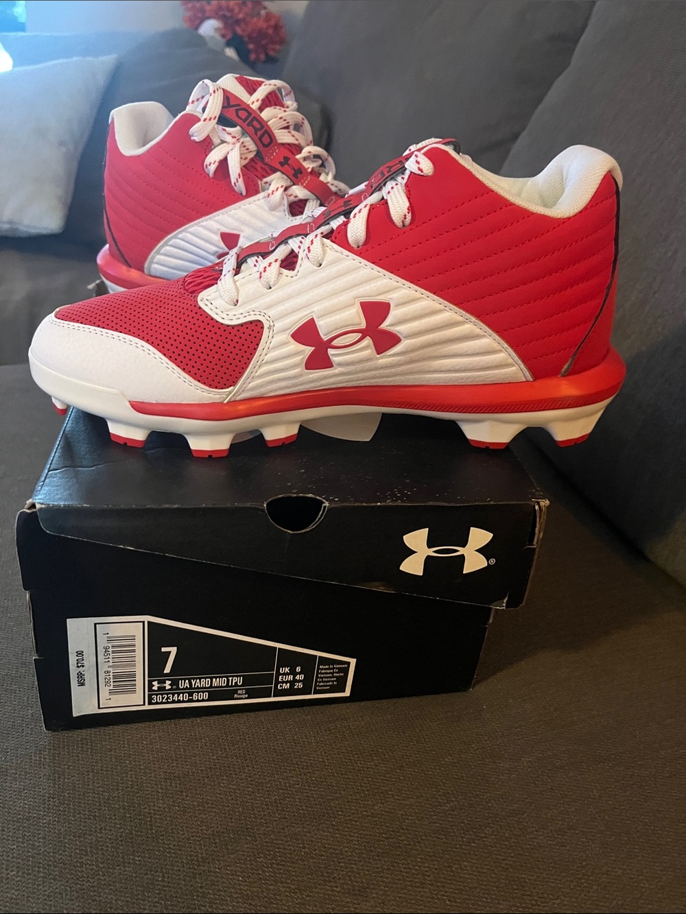 Under Armour Kids Red and White Baseball Cleats with Logo